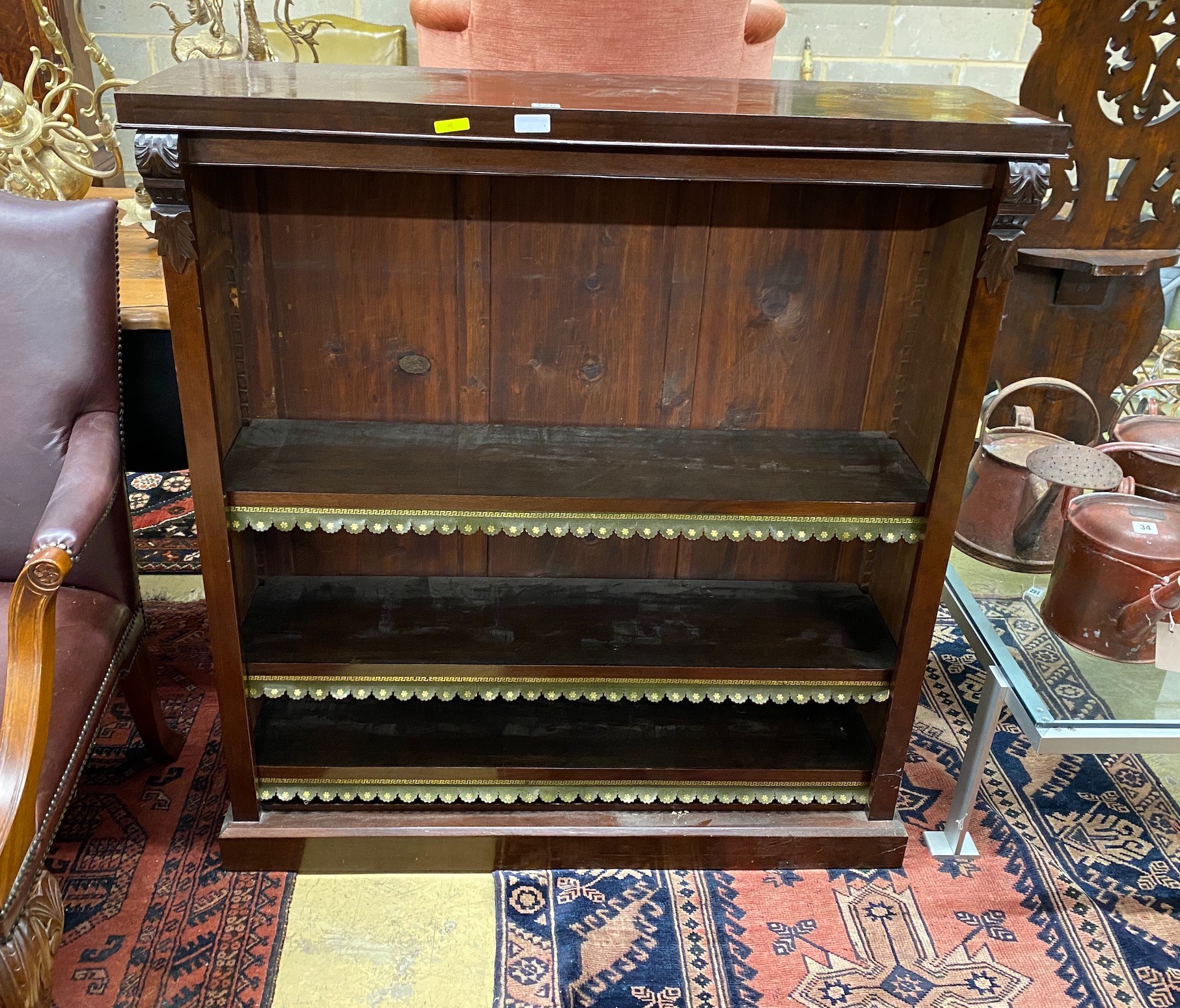 A Victorian mahogany open bookcase with carved acanthus mounts, width 107cm, depth 32cm, height 116cm